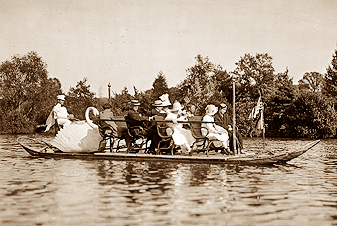 Historic picture - rowing the Swan Boat on the lake at Seneca Park