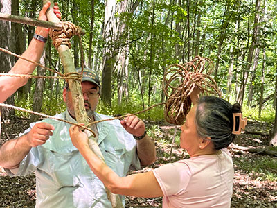 Photo of people building shelter